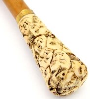 Lot 395 - Japanese umbrella, the ivory hilt carved with