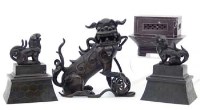 Lot 397 - Three bronze lions and soapstone seals.