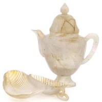 Lot 403 - Jade leaf shaped dish and a vase shaped wine ewer