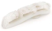 Lot 409 - Chinese jade belt hook with carved chilong handle.