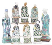 Lot 447 - Chinese set six famille vert immortals and two similar figures.