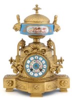 Lot 679 - Gilt mantel clock with porcelain panel