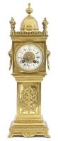 Lot 680 - Brass mantel clock in the form of a longcase
