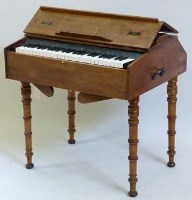 Lot 692 - Four octave portable piano by Semples in Walnut