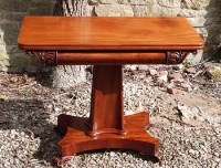 Lot 718 - Mahogany fold-over table.