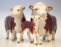 Lot 110 - Beswick Hereford cow set.