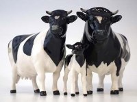 Lot 111 - Beswick Fresien cow set.