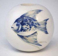 Lot 129 - Moorcroft saltglaze fish candle holder.