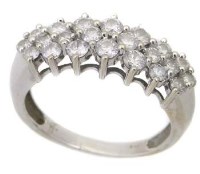 Lot 198 - 14k white gold half hoop eternity ring set with