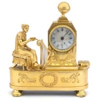 Lot 393 - Neo-classical gilt mantel clock.