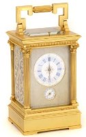 Lot 395 - French gilt brass striking and repeating alarm carriage clock, the white enamel Roman dial and alarm set enclosed within a gilt guilloche mask, eight