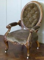 Lot 415 - Victorian walnut gentlemans arm chair.