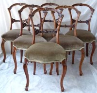 Lot 416 - Six Victorian single dining chairs with walnut
