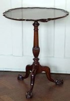 Lot 434 - Mahogany wine table.
