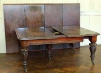 Lot 448 - Victorian wind-out dining table complete with