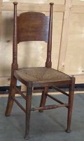 Lot 449 - Arts and Crafts rush seated oak chair   designed