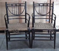 Lot 453 - Pair of Arts and Crafts Ebonised armchairs possibly by Heals