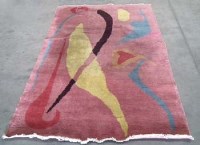 Lot 462 - 1930's style pink ground rug