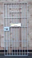 Lot 465 - Jail door,   with pierced title panel reading