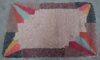 Lot 495 - Art Deco design tufted rug,   104cm long.