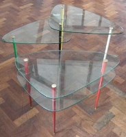 Lot 544 - Two 1950's design glass two tier tables   with