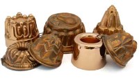 Lot 21 - 7 copper jelly moulds.