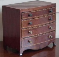 Lot 29 - Mahogany apprentice chest.