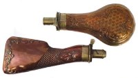 Lot 84 - Two powder flasks stamped Dixon.