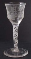 Lot 123 - Wine Glass engraved with Oriental figures.
