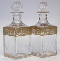 Lot 132 - Pair of St. Louis gilt decanters.