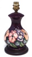 Lot 181 - Moorcroft pansy lamp base.