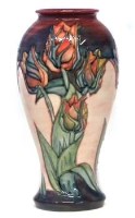 Lot 189 - Moorcroft red tulip vase.