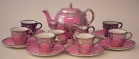 Lot 224 - Silver overlaid pink ceramic teaset.