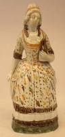 Lot 279 - Unusual Prattware figure of a Tavern Wench circa