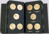 Lot 312 - Fifty silver gilt medallions A History of the