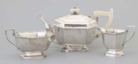 Lot 315 - Silver three piece tea set.