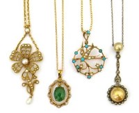 Lot 329 - Four necklace chains with pendants