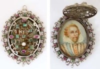 Lot 344 - Silver locket with pearl, emerald and rubies with