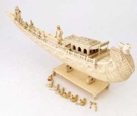Lot 413 - Ivory model of a boat.