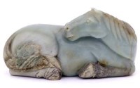 Lot 440 - Jade model of a recumbent horse, 19th or 20th century.