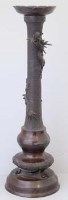 Lot 444 - Japanese bronze floor standing candlestick.