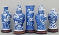 Lot 505 - Garniture blue and white chinose vases.