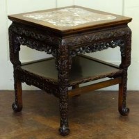 Lot 508 - Chinese hardwood table with inset marble top.