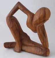Lot 617 - Modern figural teak sculpture.