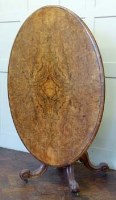 Lot 810 - Victorian figured walnut oval breakfast table
