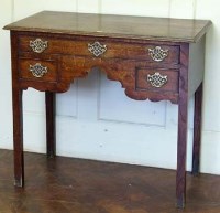 Lot 814 - George III oak side table