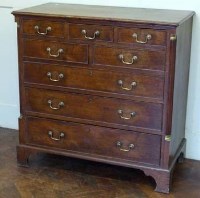 Lot 817 - Oak chest of five short and three long cock beaded drawers