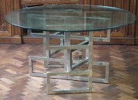 Lot 828 - Modern design glazed chromed table  with