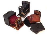 Lot 24 - Sanderson camera and a Sybil camera.