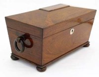 Lot 29 - Rosewood sarcophagus tea caddy with ring handles.
